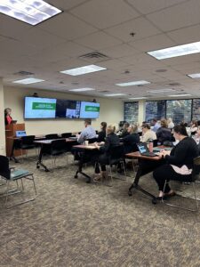 October 2023 HR Forum - Group of Attendees Listening to Speaker